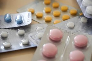 multiple types of pills in containers